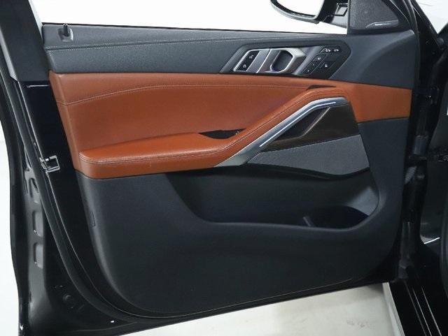 used 2023 BMW X6 car, priced at $54,287
