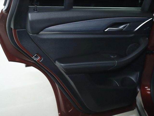 used 2025 BMW X4 car, priced at $54,980