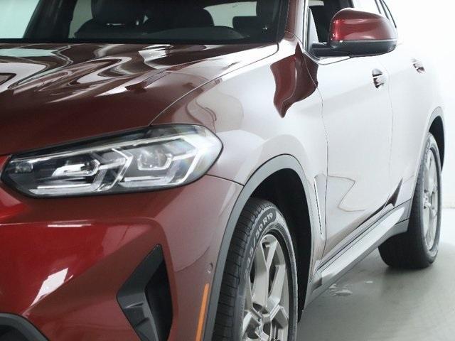 used 2025 BMW X4 car, priced at $54,980