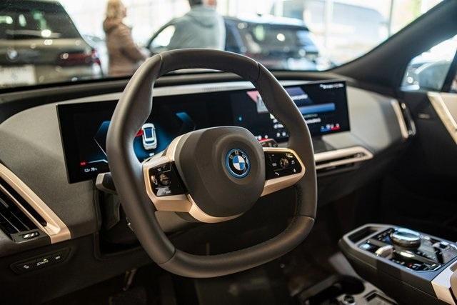 new 2024 BMW iX car, priced at $97,355