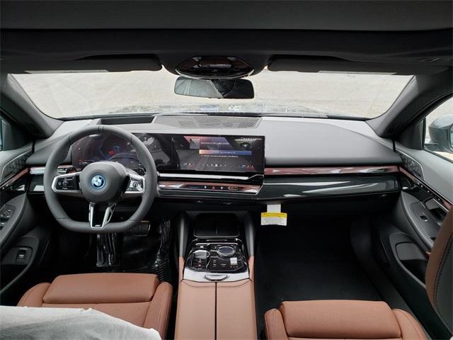 new 2025 BMW 550e car, priced at $84,455