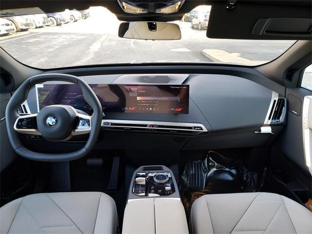 new 2026 BMW iX car, priced at $95,545