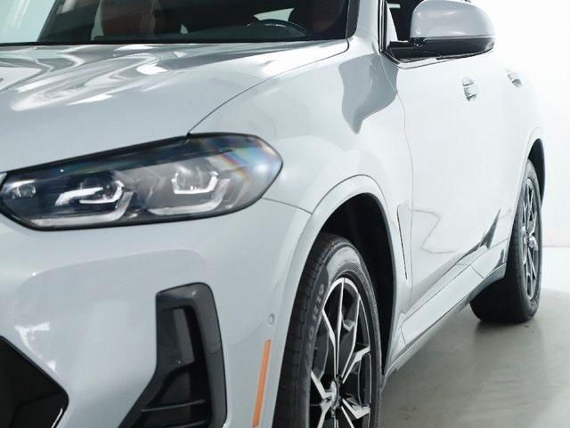 used 2023 BMW X4 car, priced at $45,210