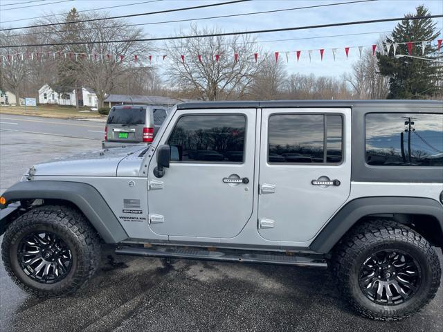 used 2015 Jeep Wrangler Unlimited car, priced at $14,488