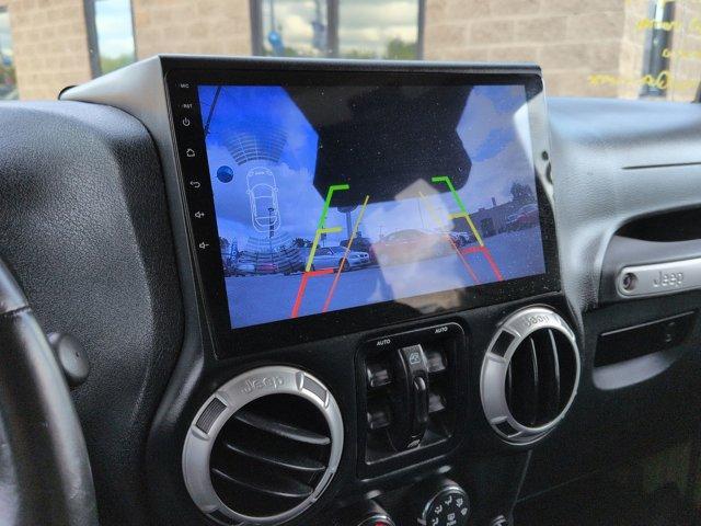 used 2013 Jeep Wrangler Unlimited car, priced at $16,499