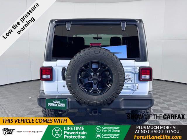 used 2023 Jeep Wrangler car, priced at $33,459