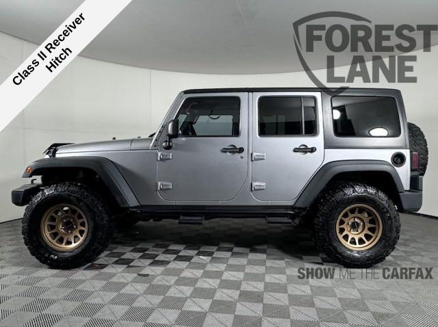 used 2014 Jeep Wrangler Unlimited car, priced at $22,389