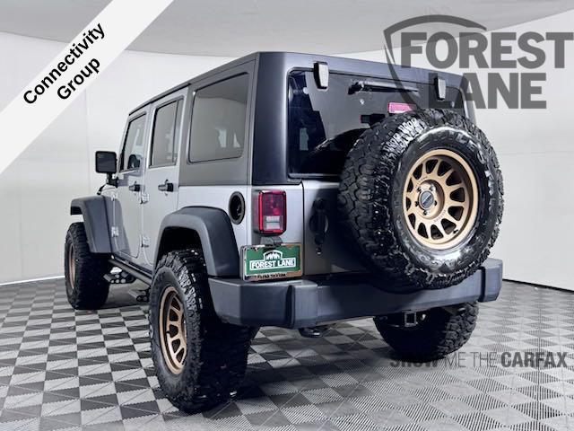 used 2014 Jeep Wrangler Unlimited car, priced at $20,981