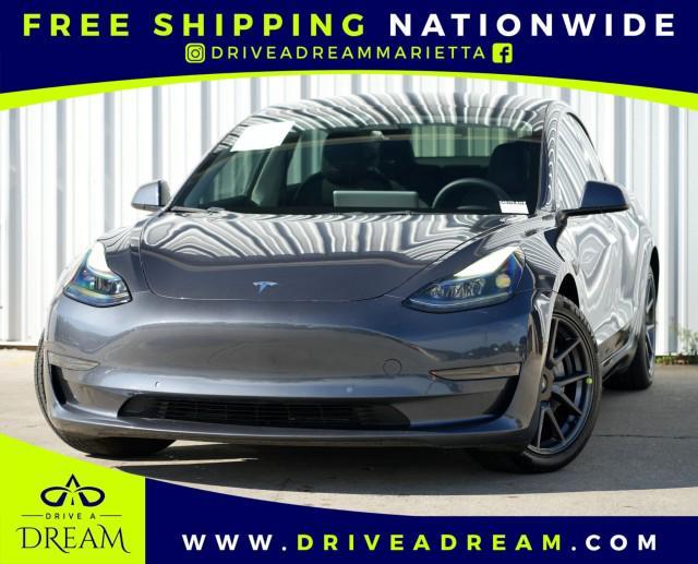 used 2022 Tesla Model 3 car, priced at $20,000