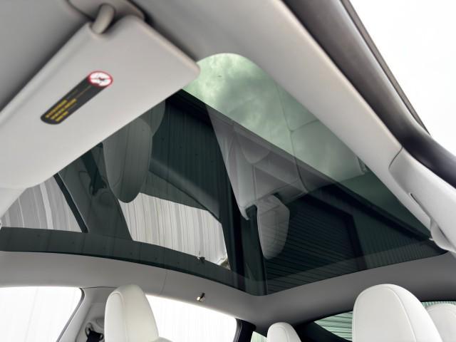 used 2024 Tesla Model Y car, priced at $33,000