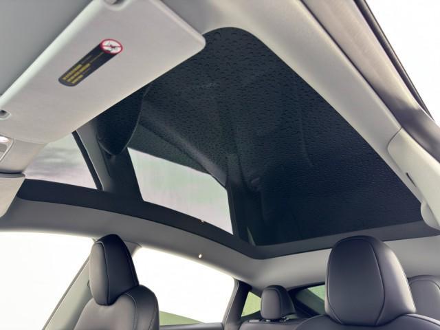 used 2023 Tesla Model Y car, priced at $28,000