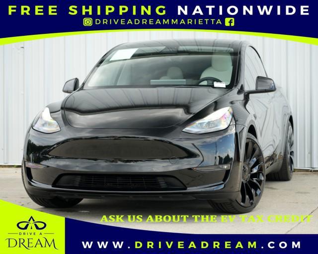 used 2022 Tesla Model Y car, priced at $23,000