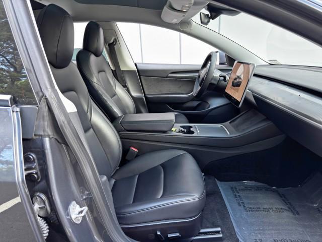 used 2023 Tesla Model 3 car, priced at $20,000