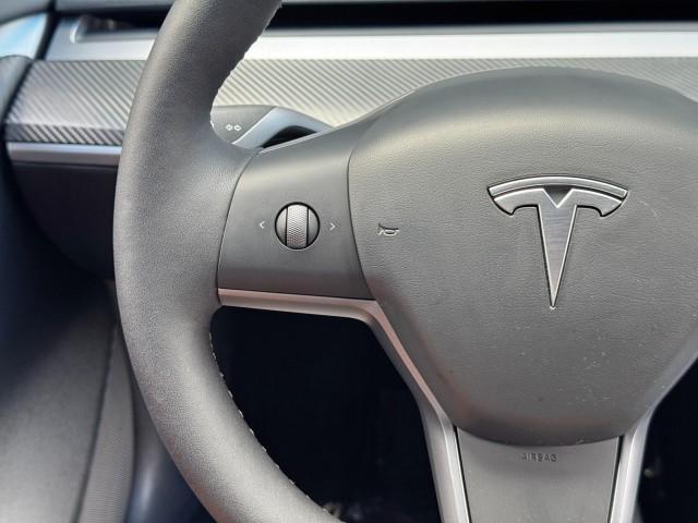 used 2023 Tesla Model 3 car, priced at $20,000