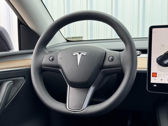 used 2024 Tesla Model Y car, priced at $31,000