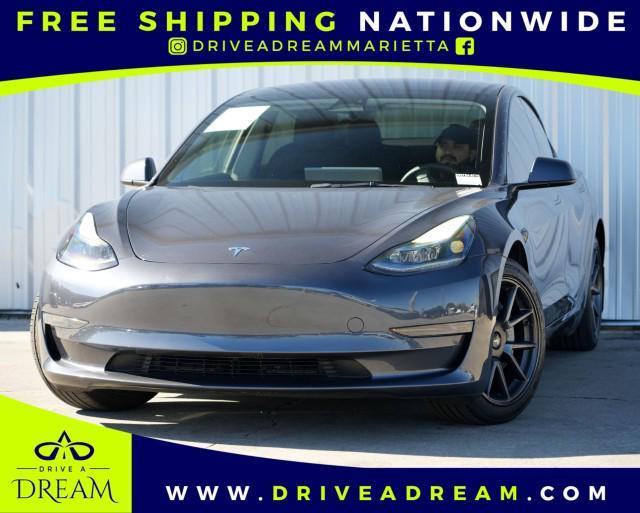 used 2023 Tesla Model 3 car, priced at $21,500