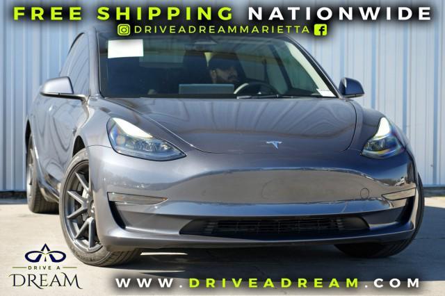 used 2023 Tesla Model 3 car, priced at $21,500