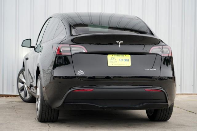used 2023 Tesla Model Y car, priced at $28,500