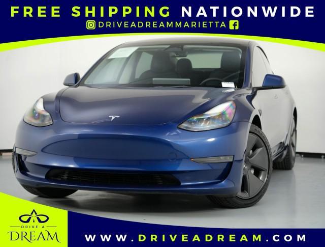 used 2023 Tesla Model 3 car, priced at $21,500