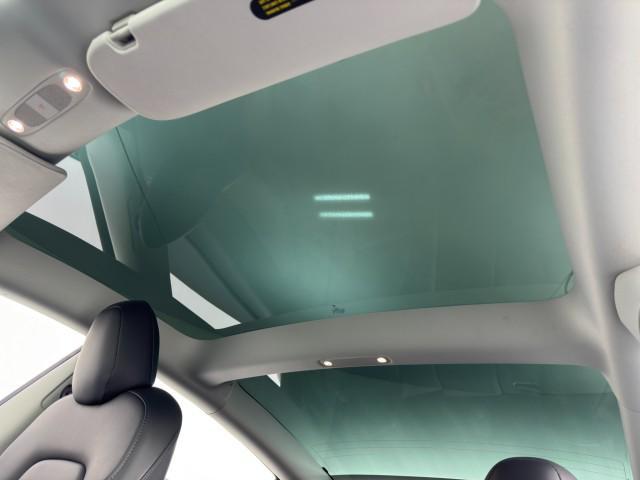 used 2023 Tesla Model 3 car, priced at $21,500