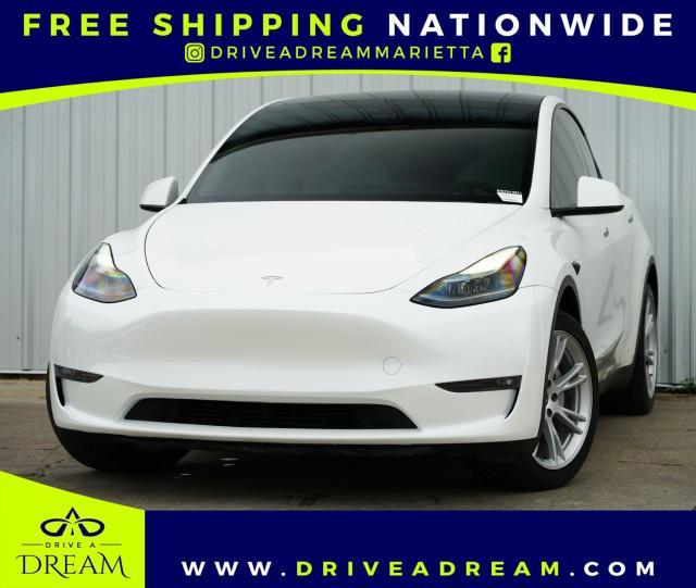 used 2023 Tesla Model Y car, priced at $27,500