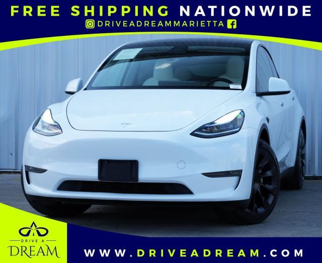 used 2023 Tesla Model Y car, priced at $27,000