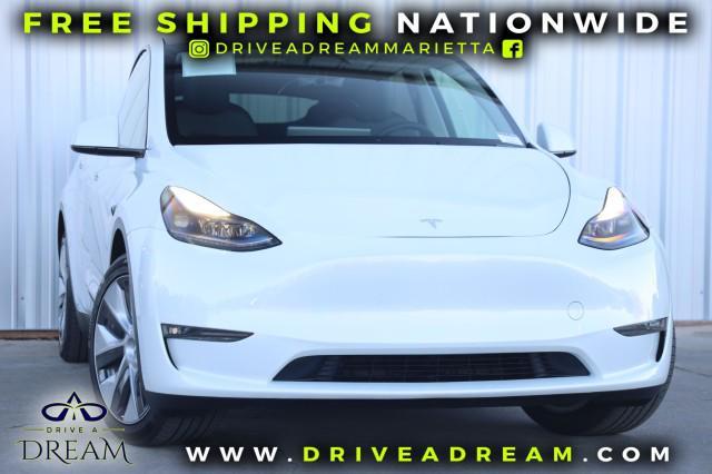 used 2023 Tesla Model Y car, priced at $27,000