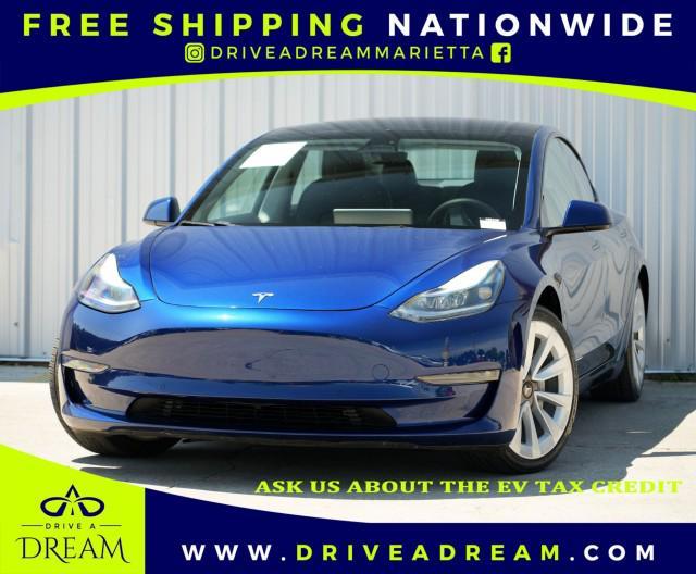 used 2022 Tesla Model 3 car, priced at $18,000