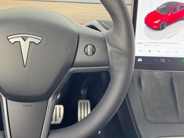 used 2024 Tesla Model Y car, priced at $30,000