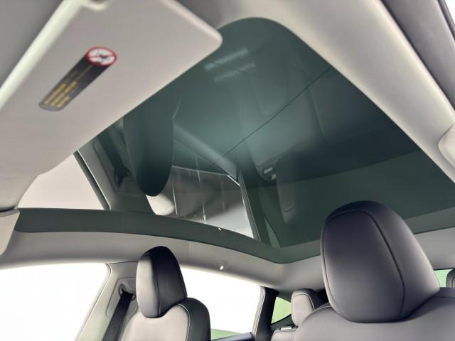 used 2024 Tesla Model Y car, priced at $30,000