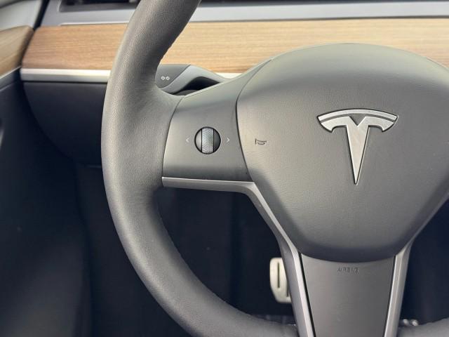 used 2024 Tesla Model Y car, priced at $30,000