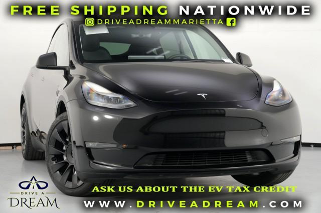 used 2023 Tesla Model Y car, priced at $28,750