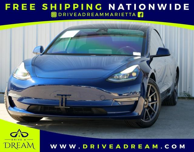 used 2022 Tesla Model 3 car, priced at $23,000