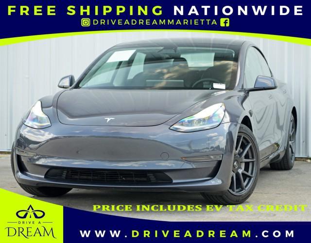 used 2021 Tesla Model 3 car, priced at $20,000