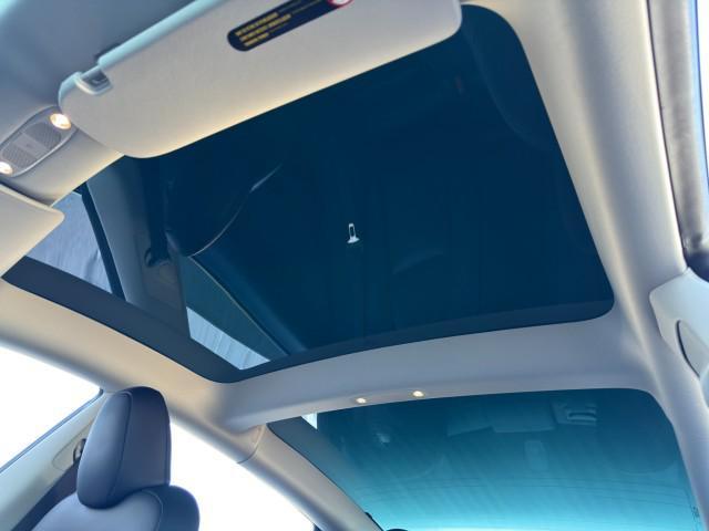 used 2023 Tesla Model 3 car, priced at $22,000