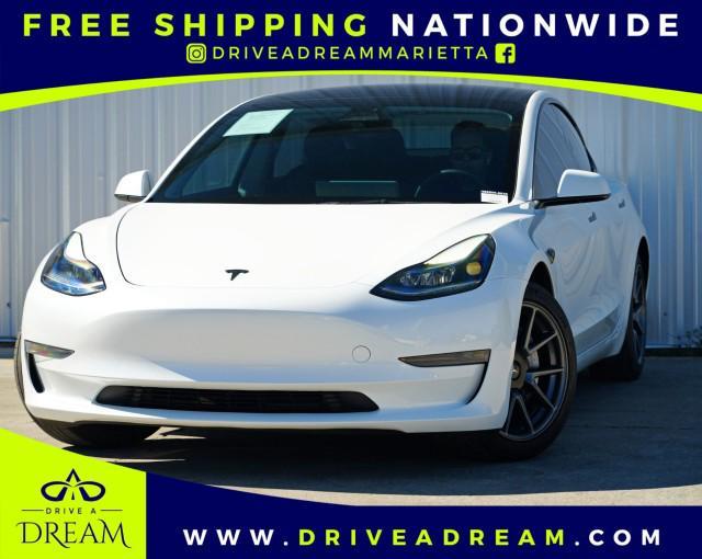used 2023 Tesla Model 3 car, priced at $22,000