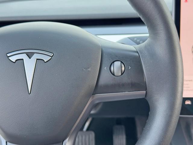 used 2022 Tesla Model 3 car, priced at $21,000