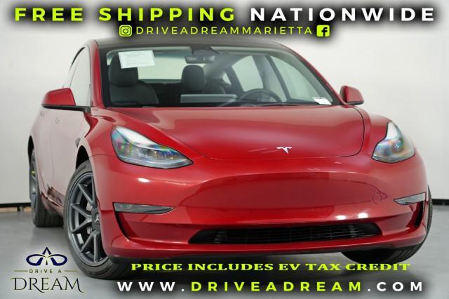 used 2023 Tesla Model 3 car, priced at $21,500