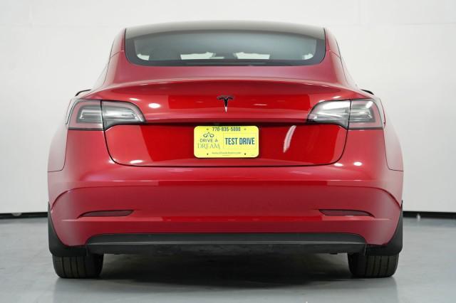 used 2023 Tesla Model 3 car, priced at $21,500