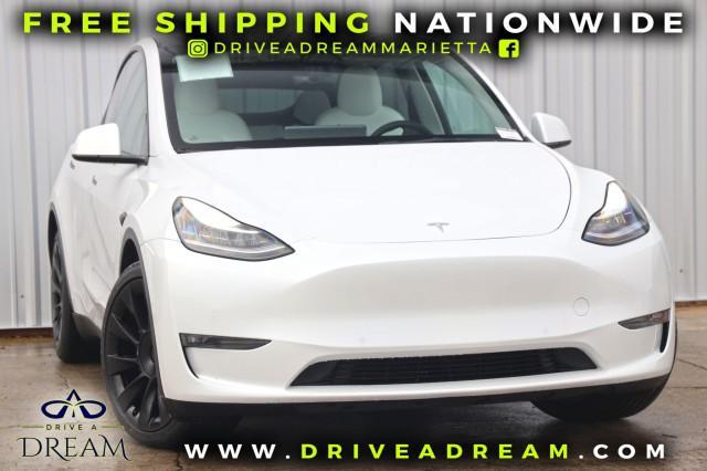 used 2022 Tesla Model Y car, priced at $27,000