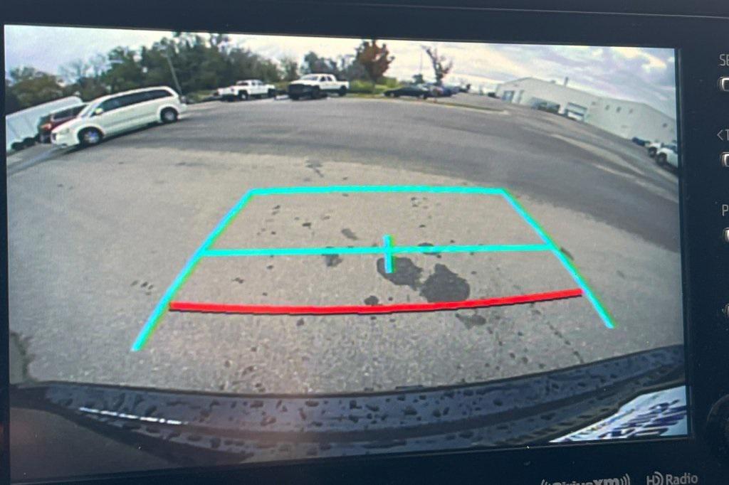 used 2020 Toyota Highlander Hybrid car, priced at $29,597