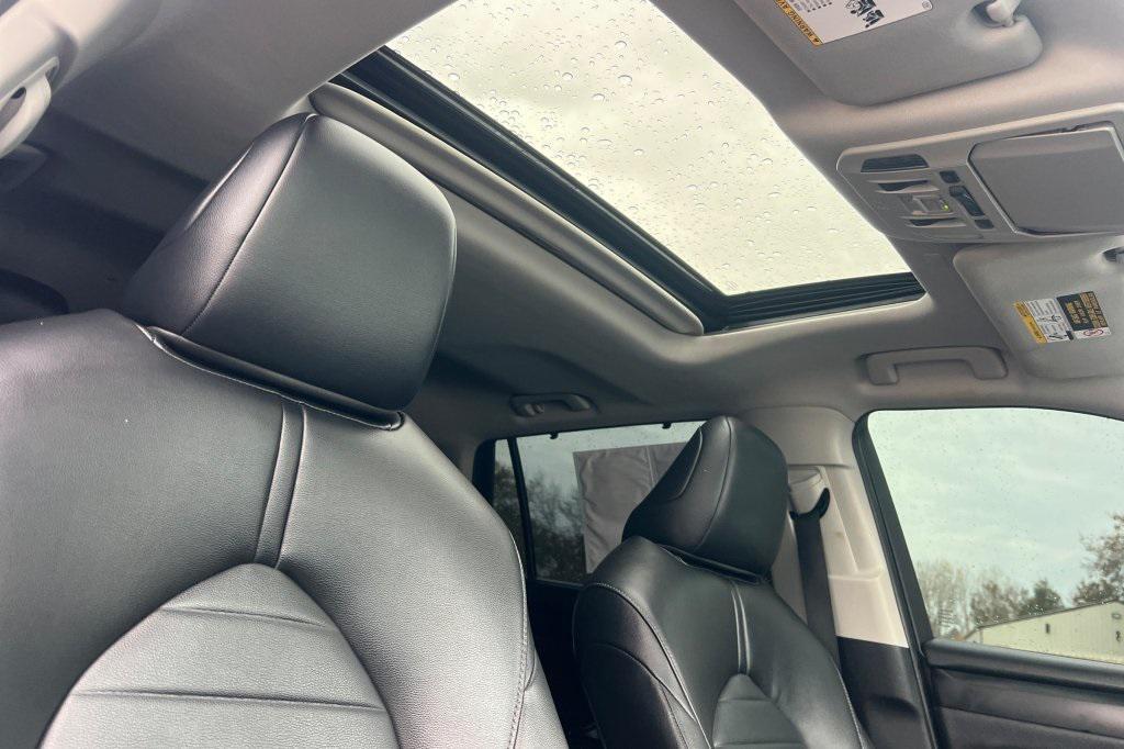 used 2020 Toyota Highlander Hybrid car, priced at $29,597