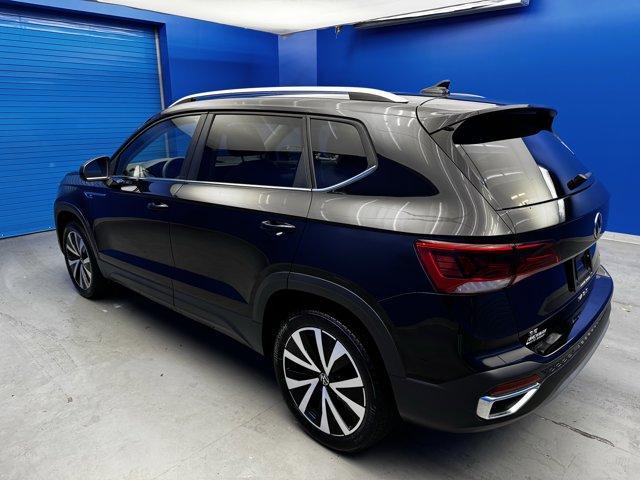 used 2023 Volkswagen Taos car, priced at $22,498