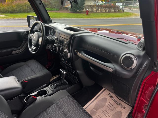 used 2011 Jeep Wrangler Unlimited car, priced at $12,999