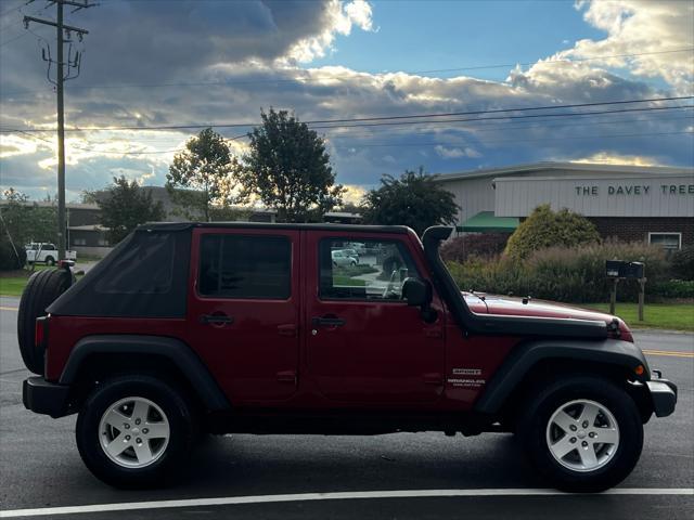 used 2011 Jeep Wrangler Unlimited car, priced at $12,999