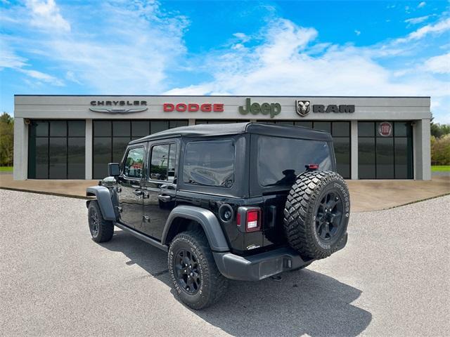 used 2021 Jeep Wrangler Unlimited car, priced at $32,157