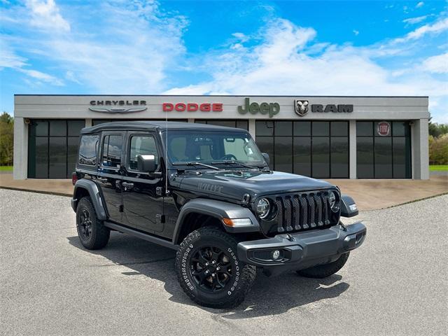 used 2021 Jeep Wrangler Unlimited car, priced at $31,957