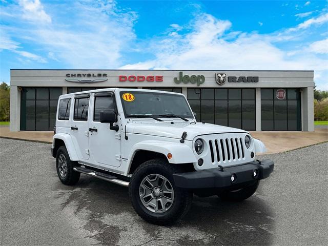 used 2018 Jeep Wrangler JK Unlimited car, priced at $25,644
