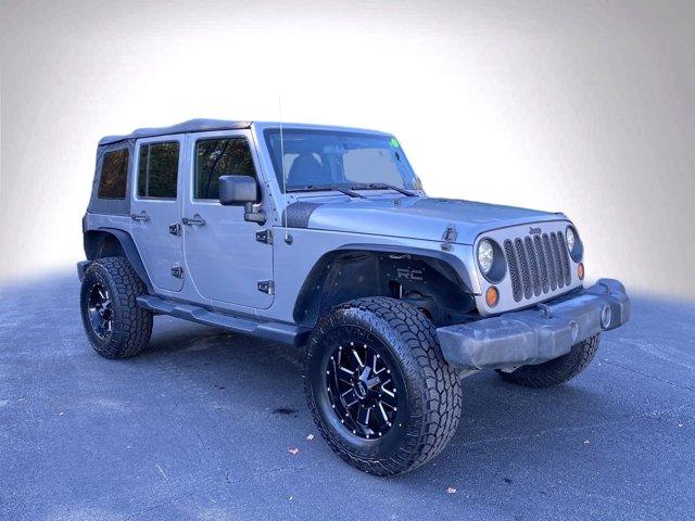 used 2013 Jeep Wrangler Unlimited car, priced at $16,910