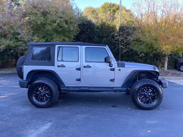 used 2013 Jeep Wrangler Unlimited car, priced at $16,910